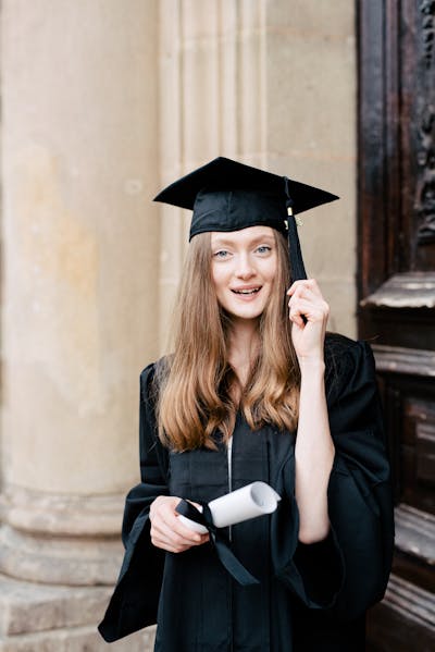 young lady in graduation outfit.