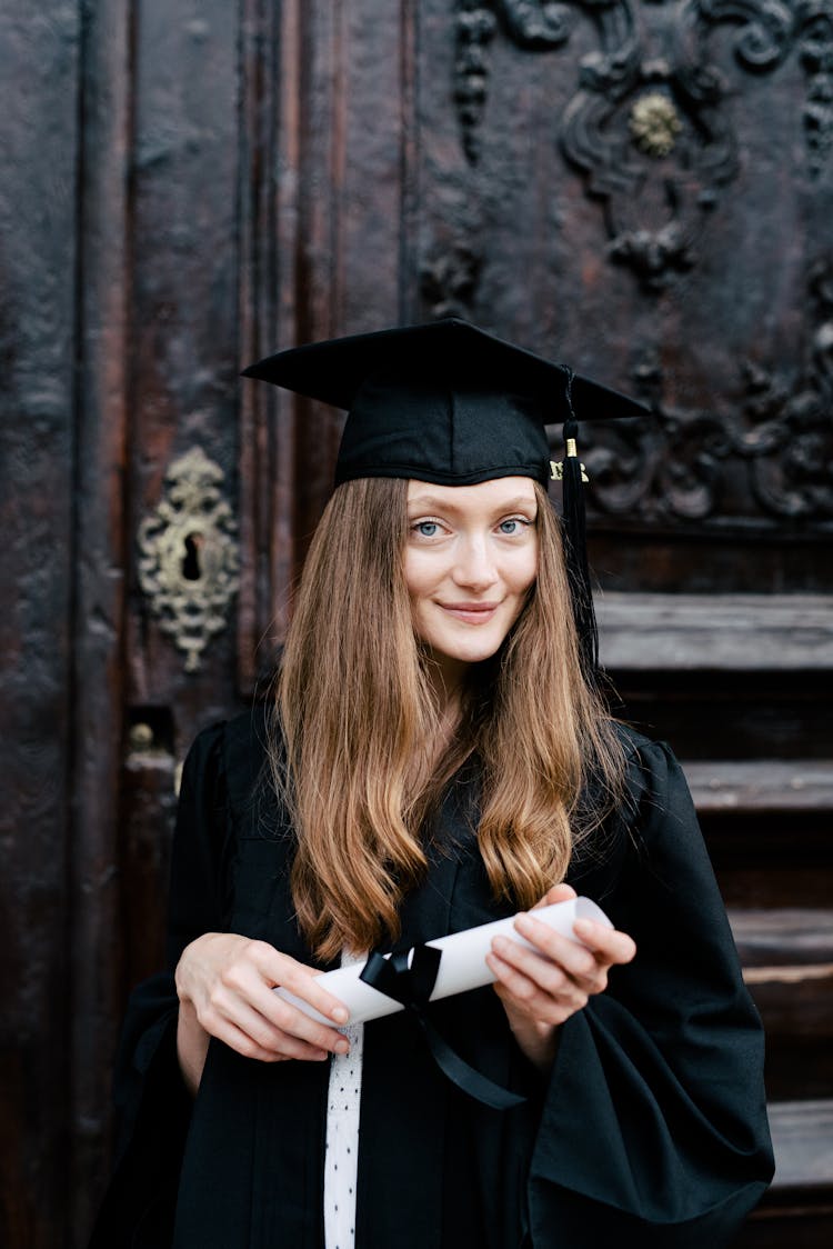 Girl Wearing Black Graduation Gown