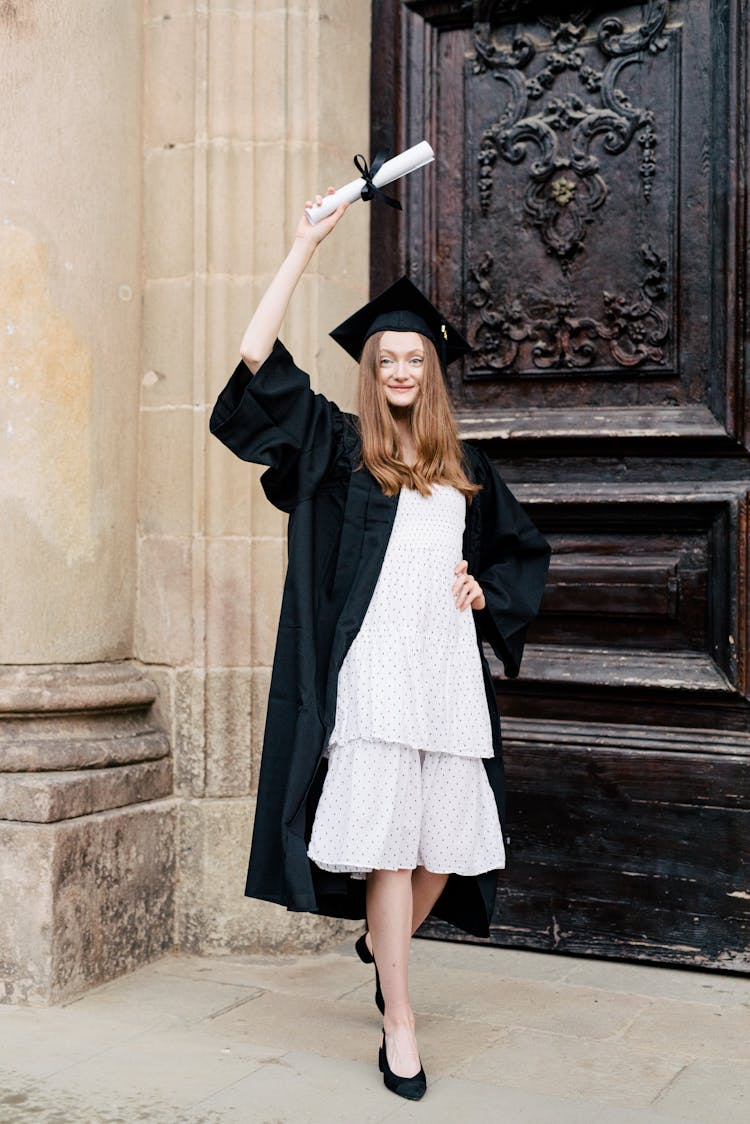 Girl Wearing Black Graduation Gown