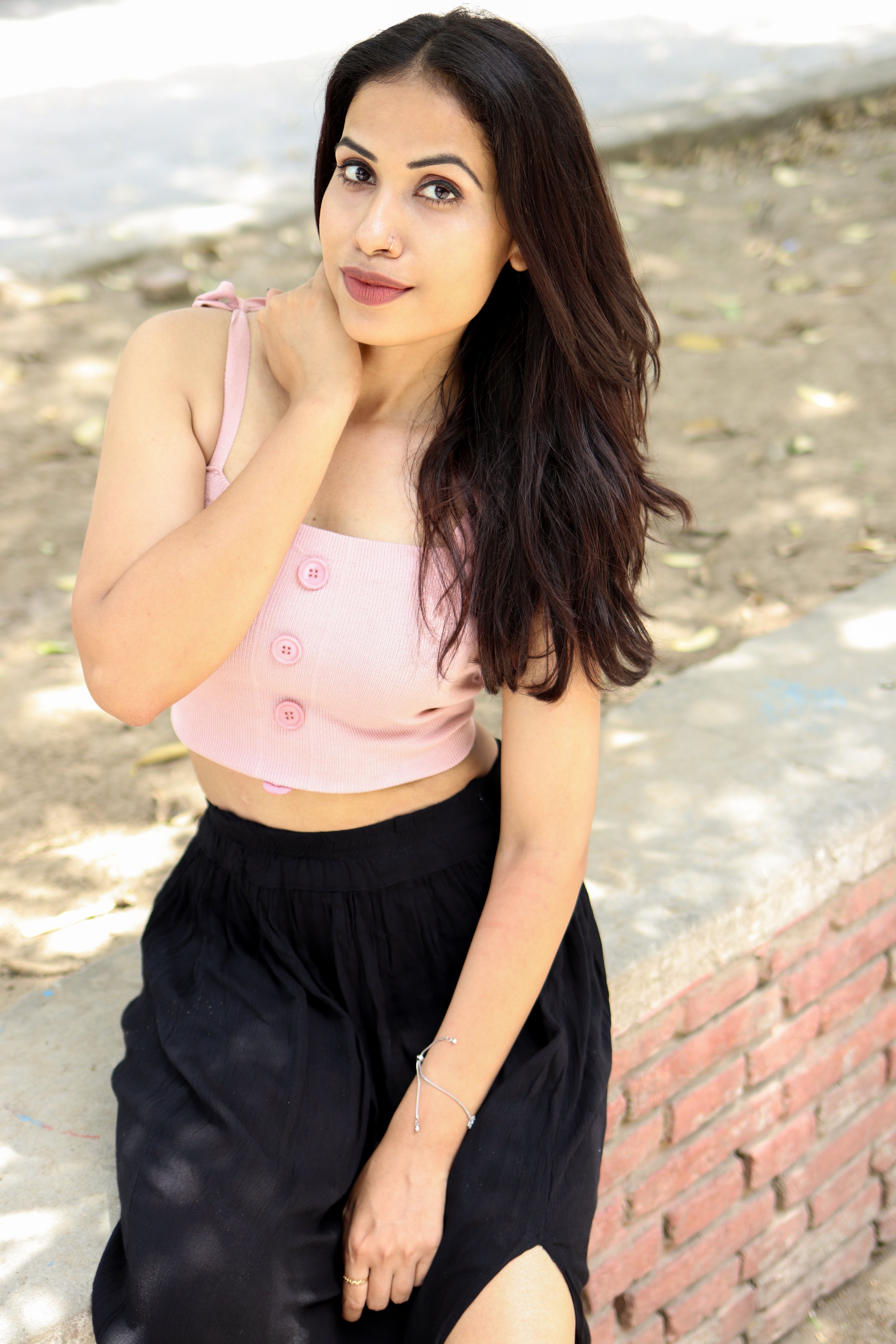 Woman in Pink Crop Top and Black Skirt · Free Stock Photo