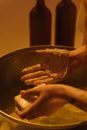 Person Holding Brown Meat on Stainless Steel Bowl