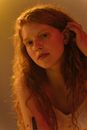 Woman Putting Hair Behind Her Ear