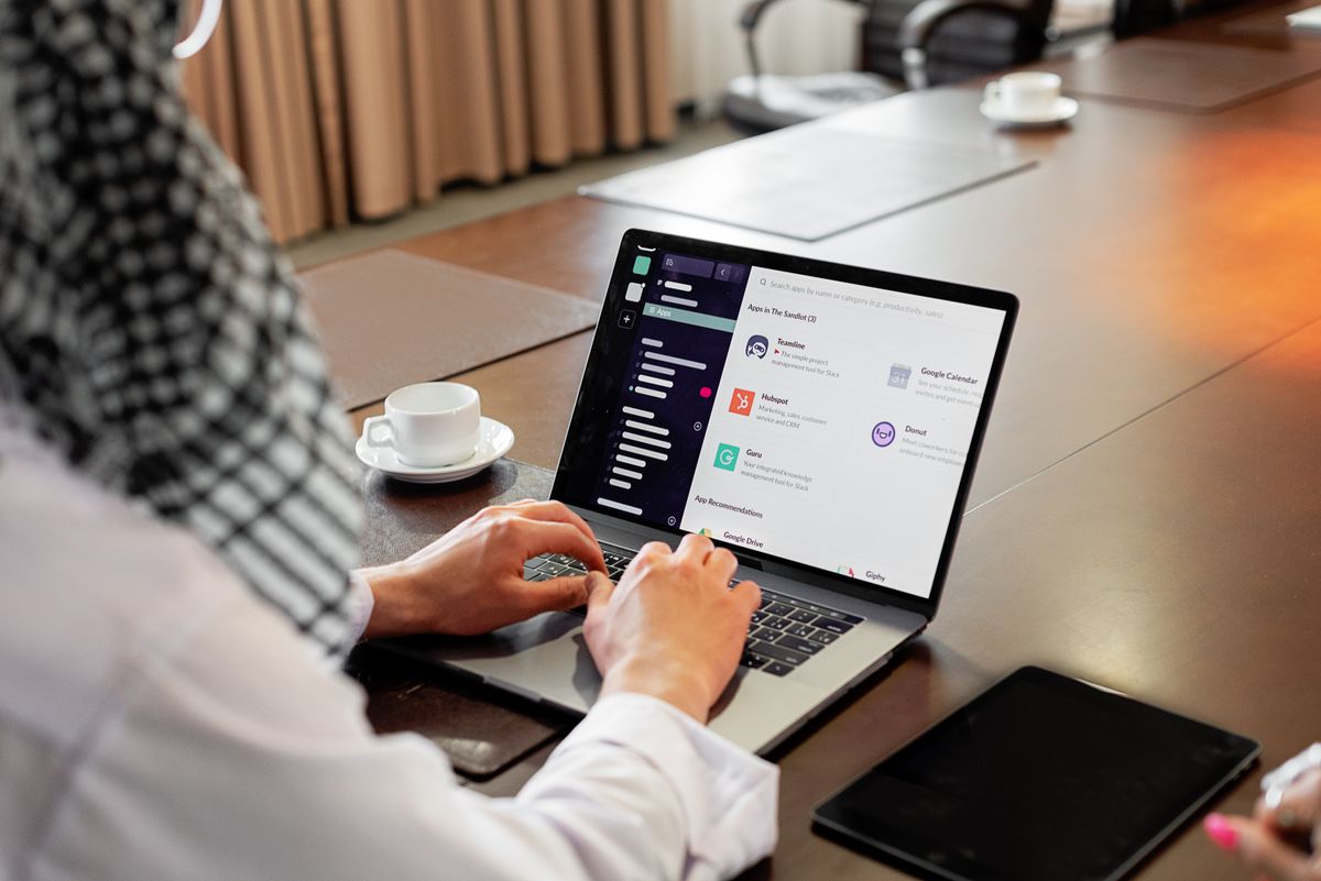 Professional using laptop for digital work