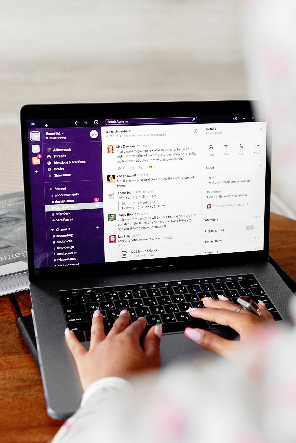Person typing details into an online credit application form on a laptop