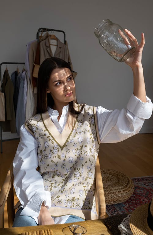 Woman Holding a Jar
