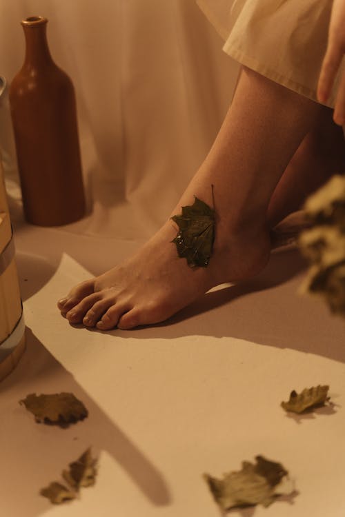Photo of a Leaf on a Person's Foot