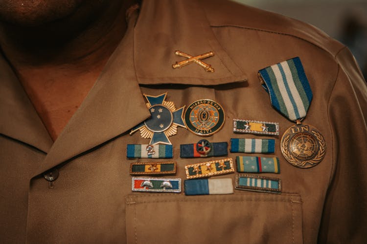 Close-Up Shot Of Military Badges