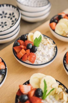 Delicious oatmeal bowls topped with fresh fruits, perfect for a healthy breakfast.