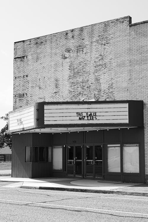 Grayscale Photo of an Abandoned Building