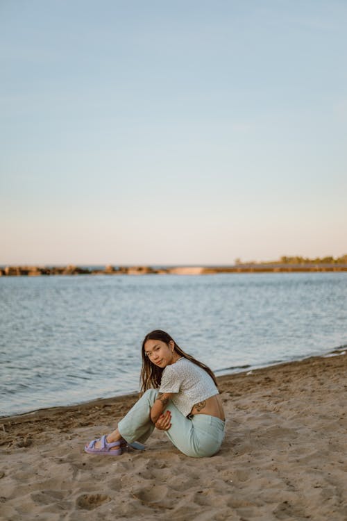 A Woman Sitting on the Beach