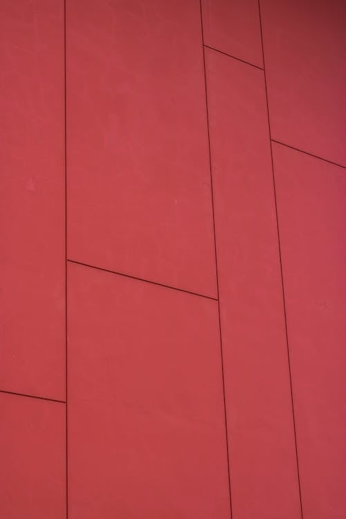 A Red Concrete Wall with Grid Lines