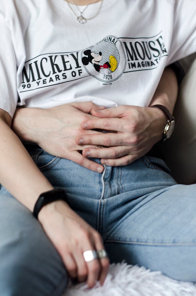 A Person Wearing A Mickey Mouse Shirt