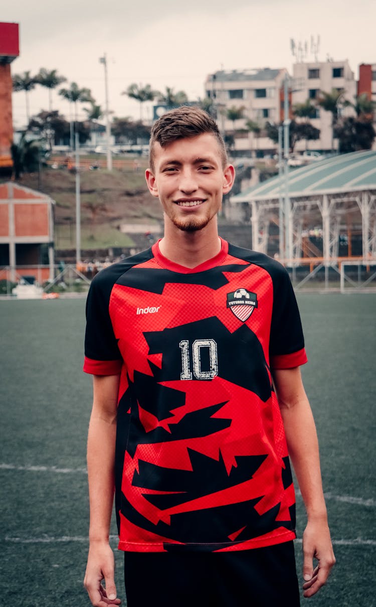 A Man Wearing A Football Shirt