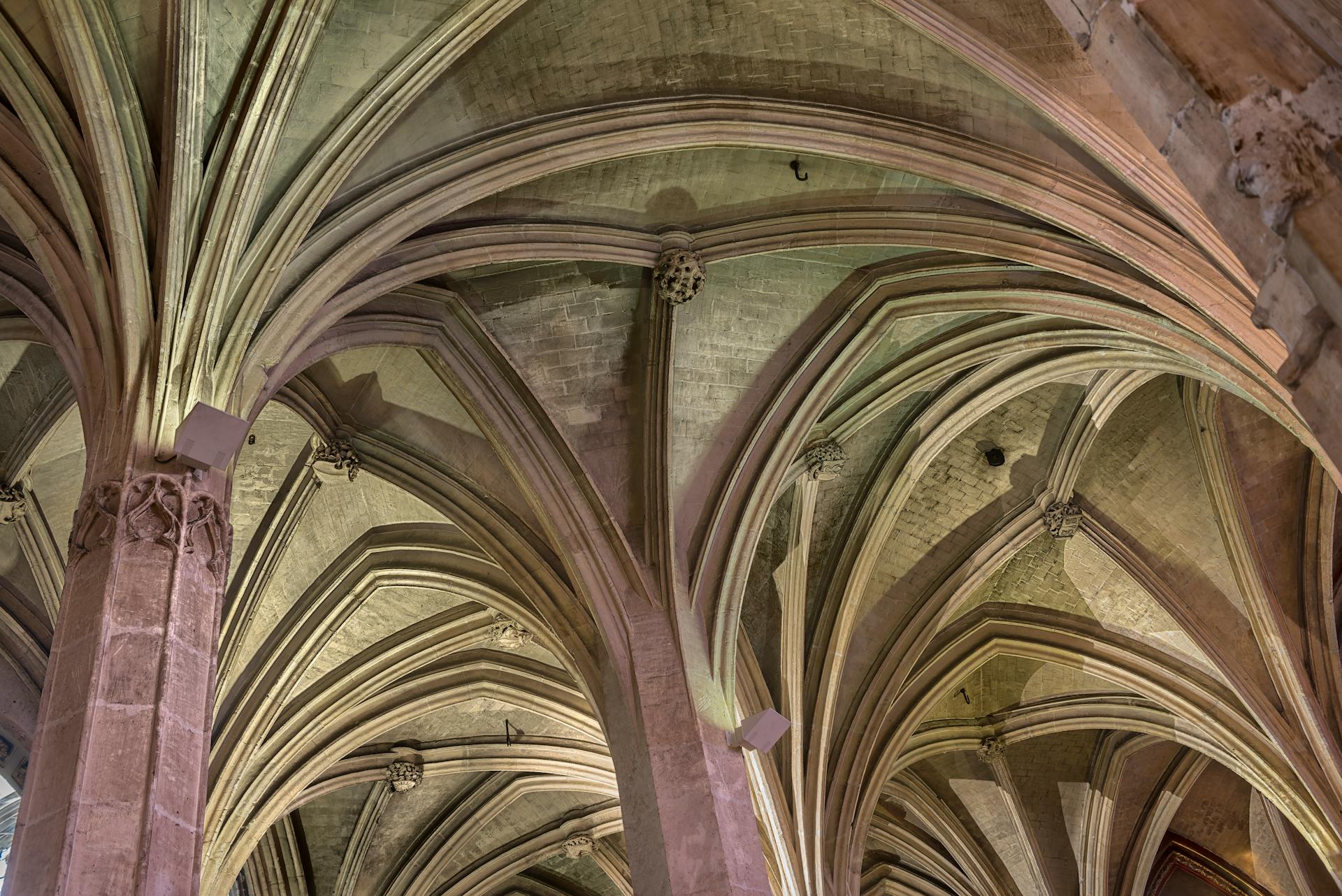 A Vaulted Ceiling with Purple Columns