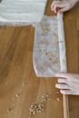 Person Holding Clear Plastic Pack