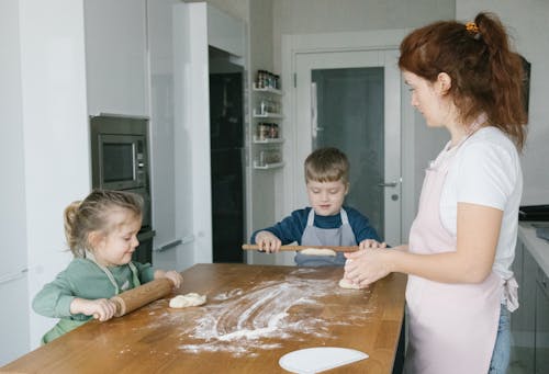 Free Mother with Her Kids Baking Together Stock Photo