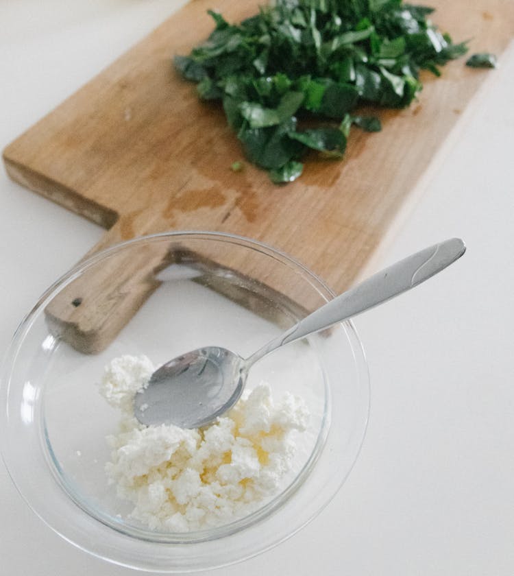 A Glass Bowl With Feta Cheese