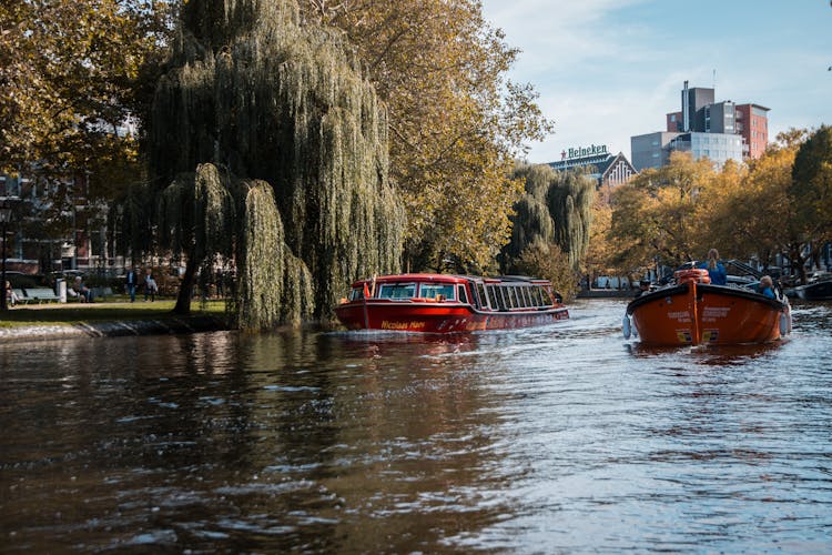 Passenger Boats Traveling The Canal