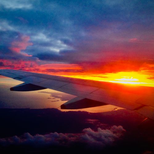 Free stock photo of above clouds, airplane sunset, airplane window Stock Photo