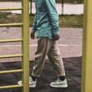 A Person with Cuffed Jeans