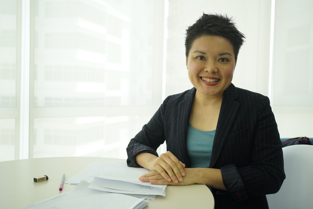 Alderpoint Realty broker at her desk reviewing client paperwork