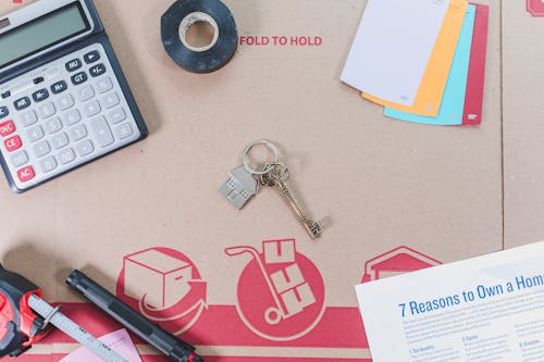 A Home Key over a Carton Box