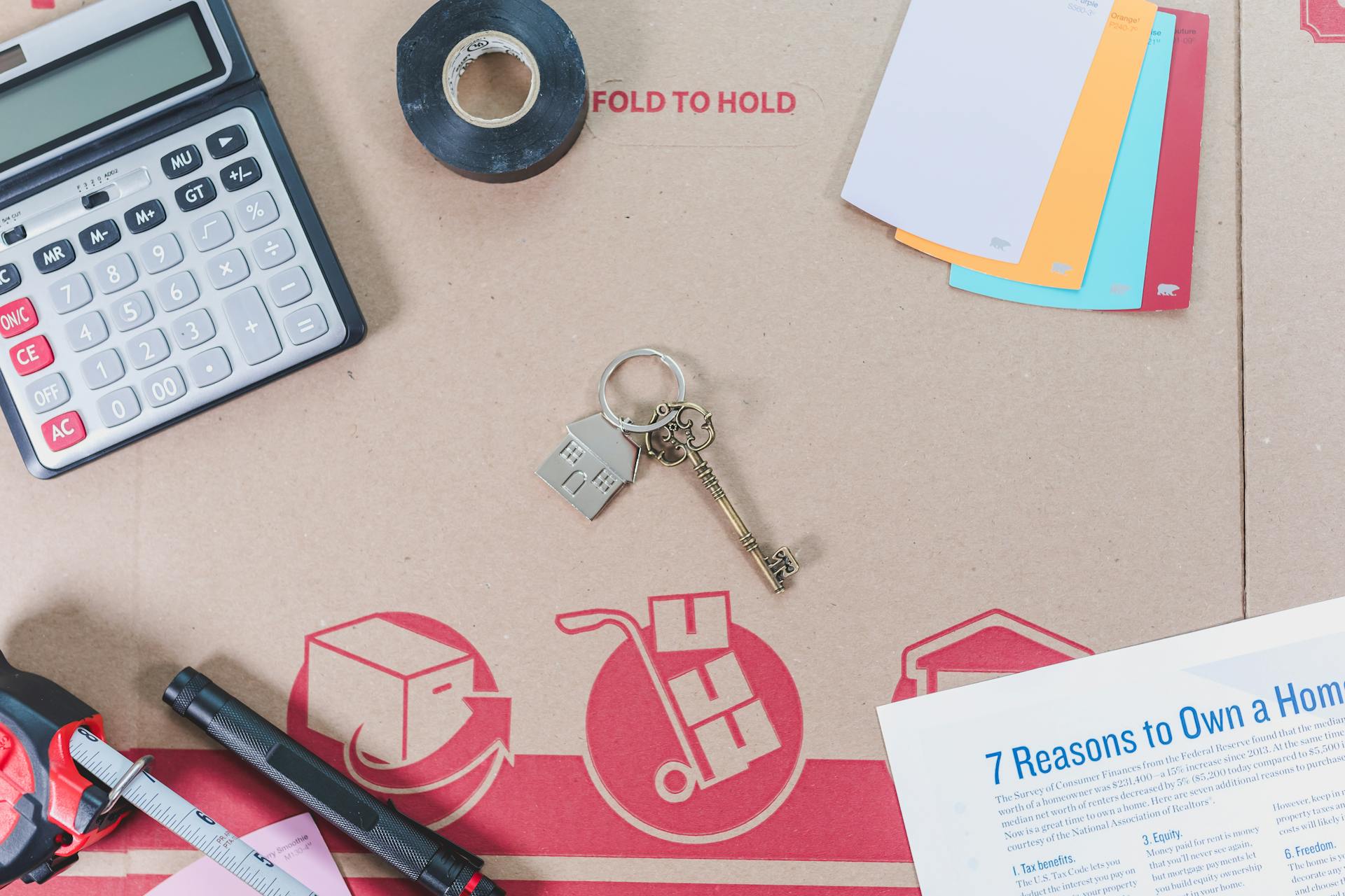 A Home Key over a Carton Box