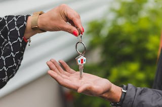 A Person Holding a Key