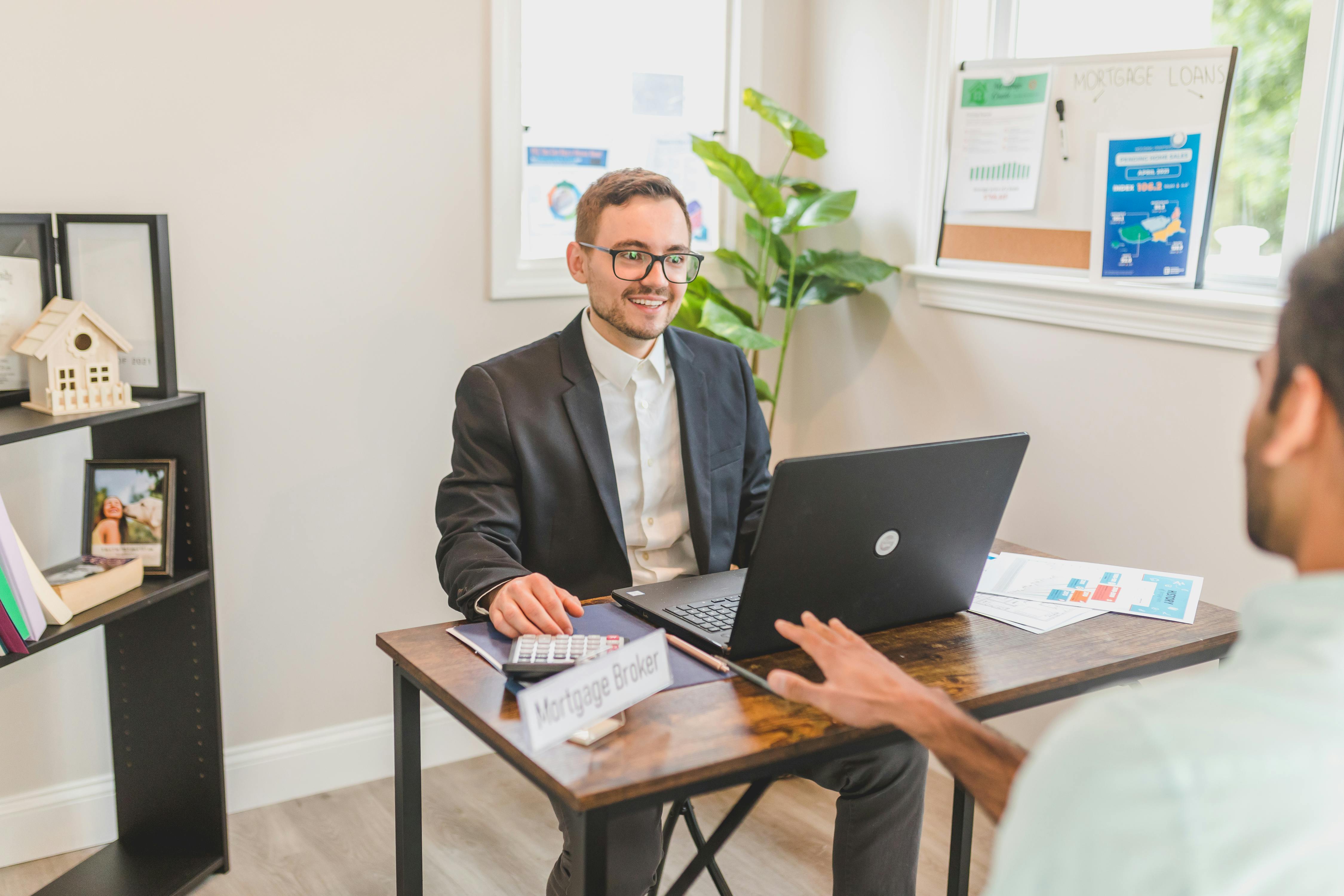 photograph of a mortgage broker sitting