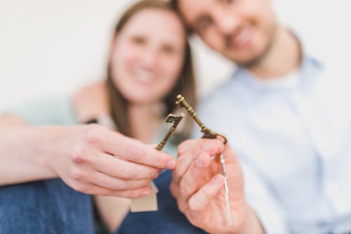 A Couple Holding their Keys