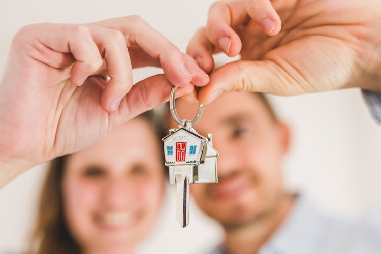 A Person Holding A Key