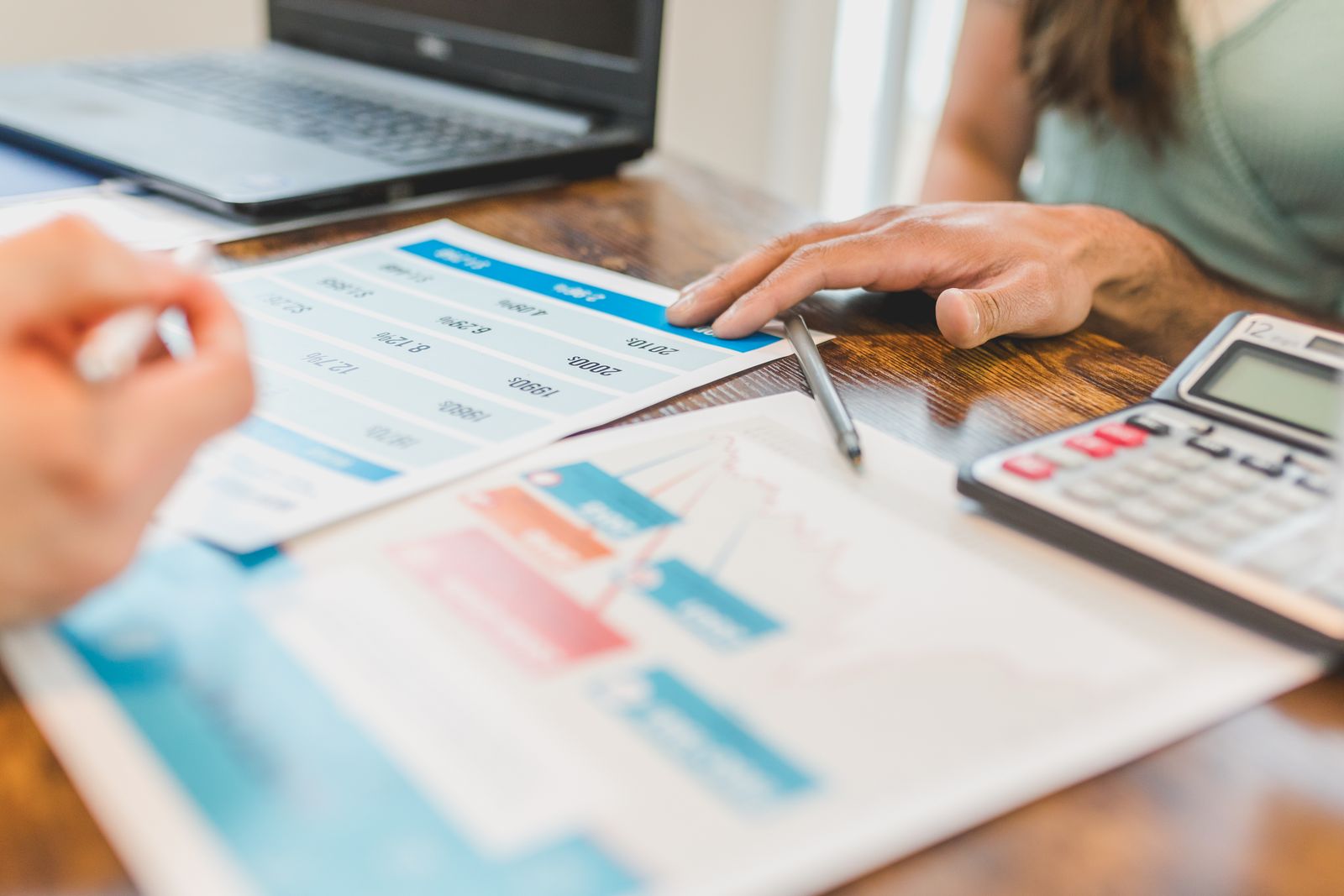 Loan officer reviewing mortgage documents for a fast closing