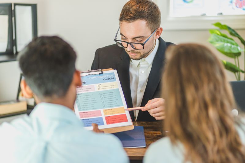 Professional reviewing a care plan with a family