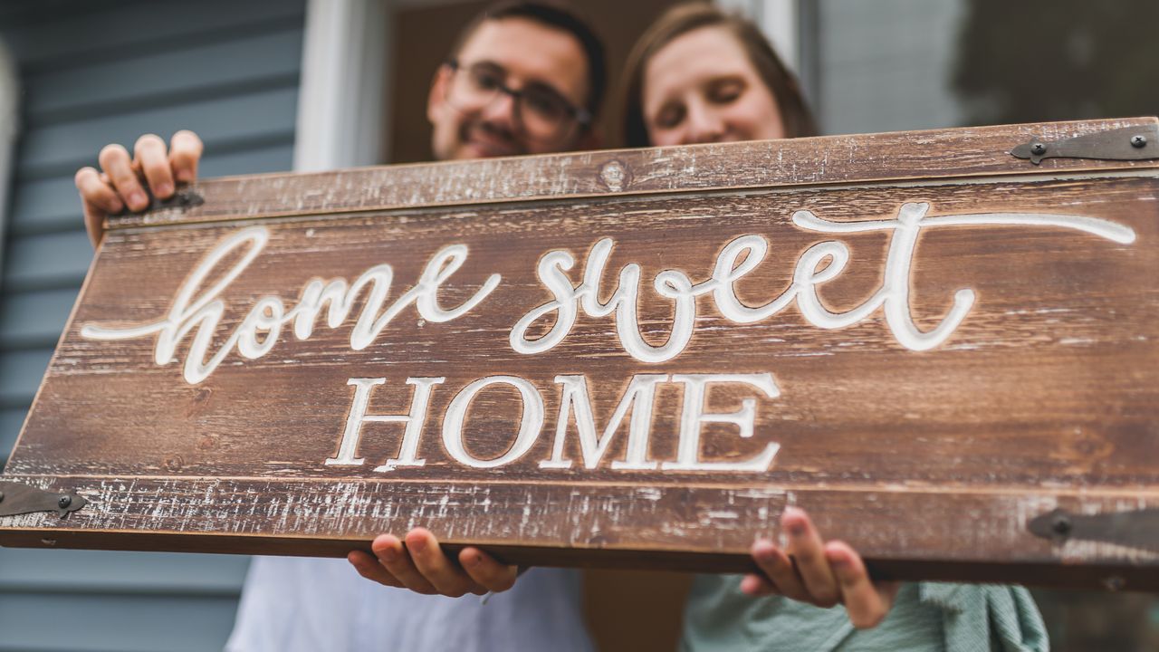 Cost effective family home search Family reviewing a home as part of a cost effective housing search