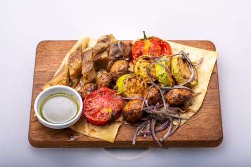 Cooked Food on the Wooden Tray