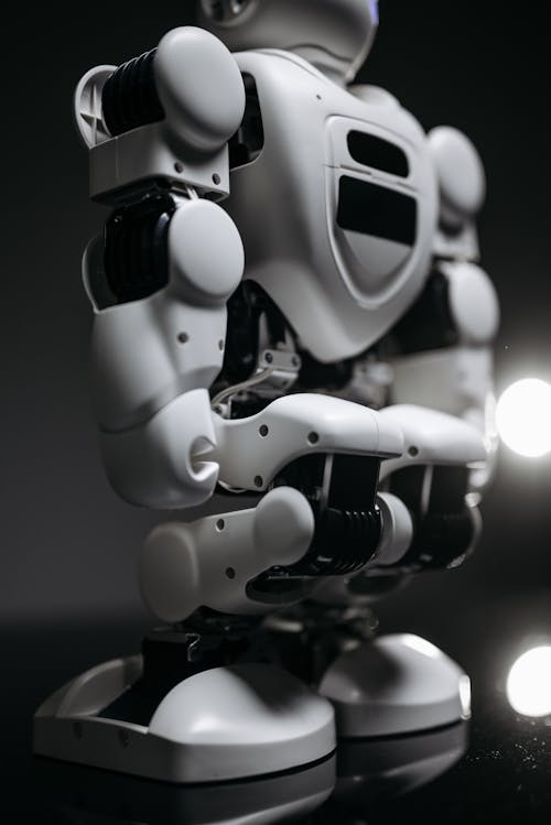 Grayscale Photo of a Futuristic Robot