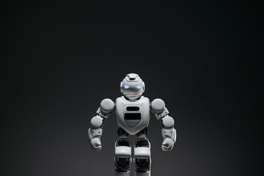 Close-up of a white toy robot with glowing eyes in a studio setting.