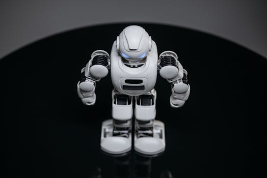 A detailed view of a white robot toy standing on a black surface, showcasing modern toy technology.
