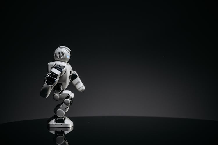 White Robot In Gray Background