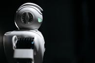 Close Up Shot of White Robot Toy