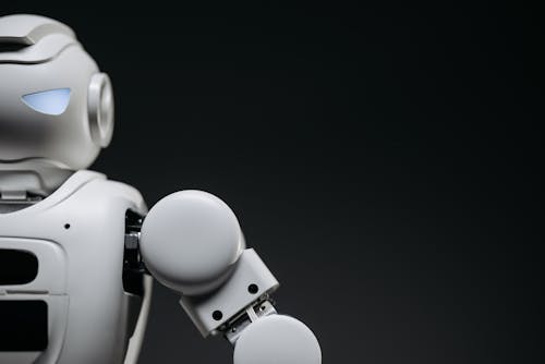 Free Grayscale Photo of a Futuristic Robot Stock Photo