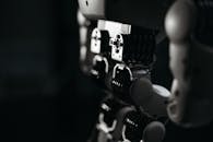 Close Up Shot of White Robot Toy