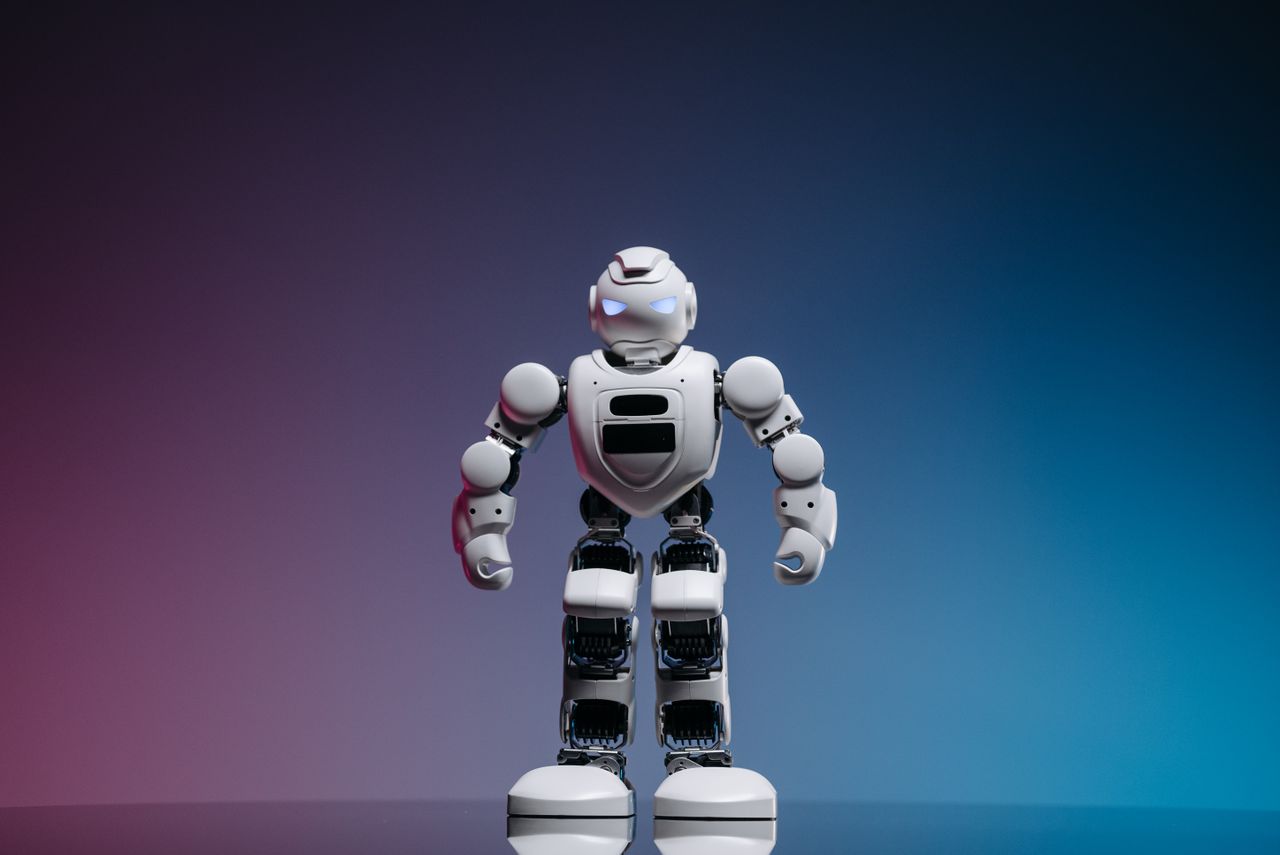 a modern toy robot standing on a gradient background showcasing innova