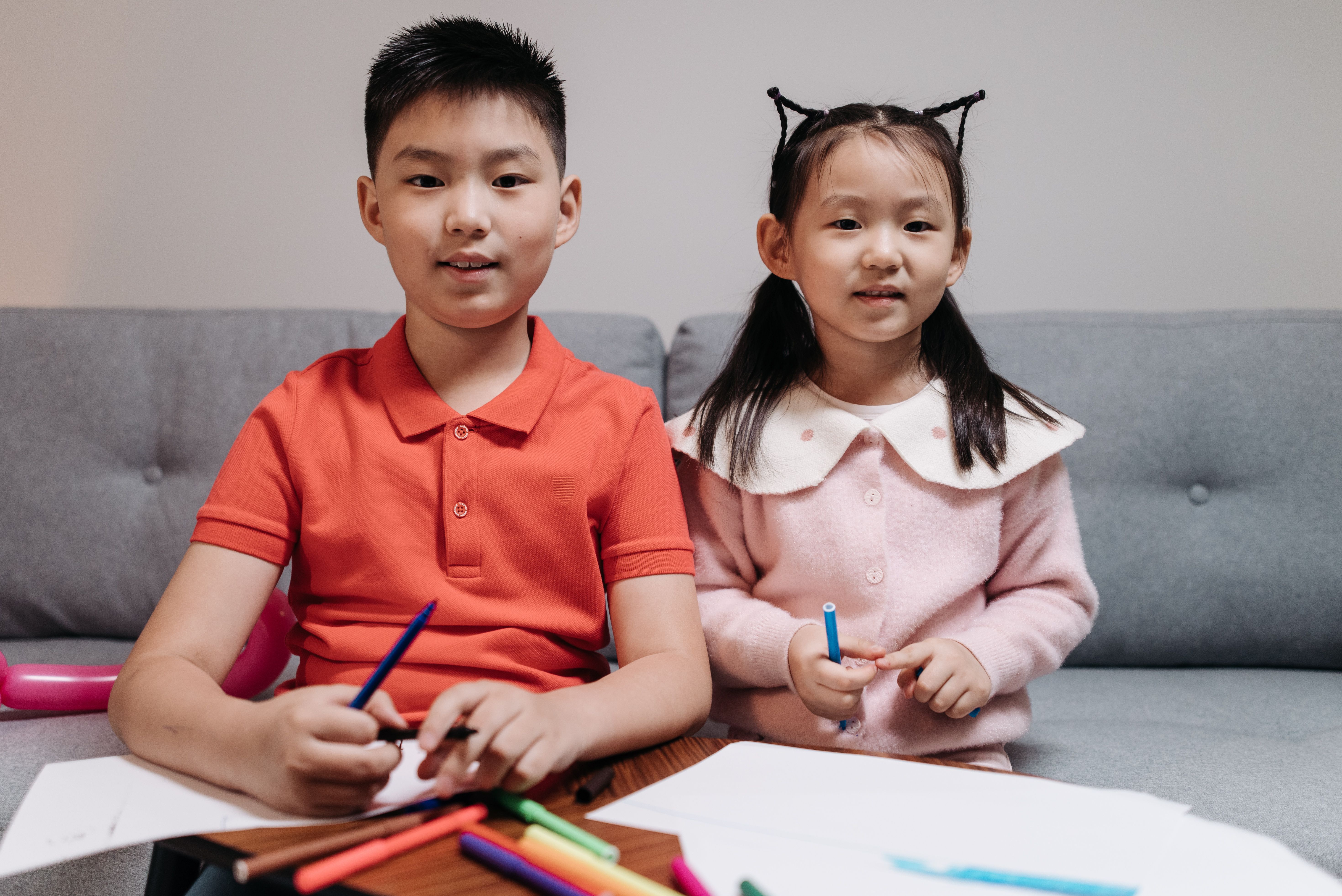 Girl and Boy Looking at the Camera · Free Stock Photo