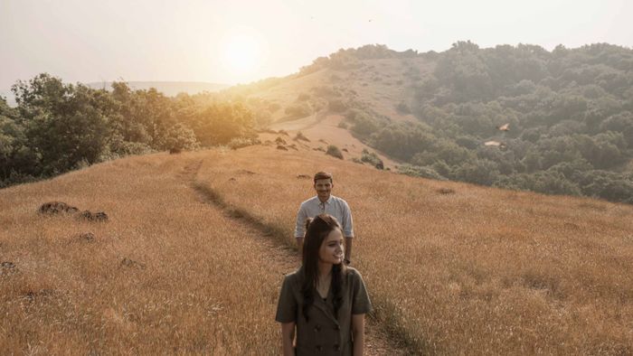 Walking through a golden field at sunset — Ankit Patel on Pexels