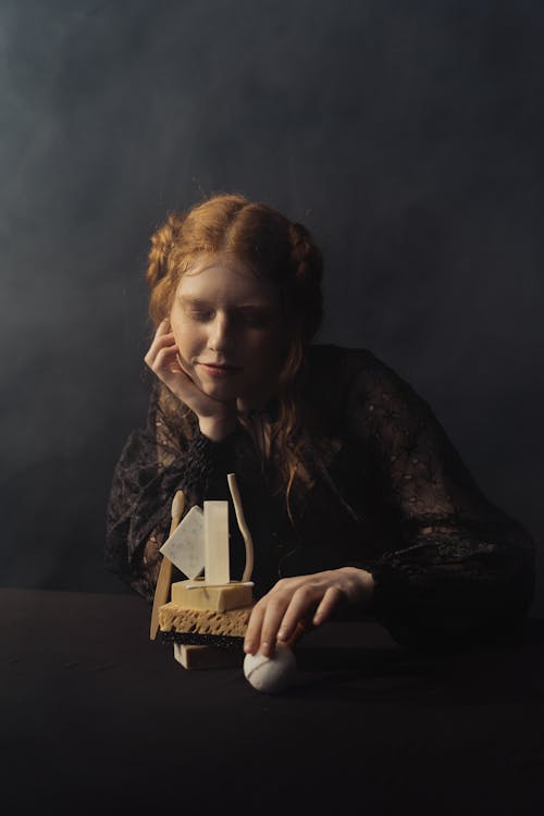 A Woman in Black Long Sleeve Shirt