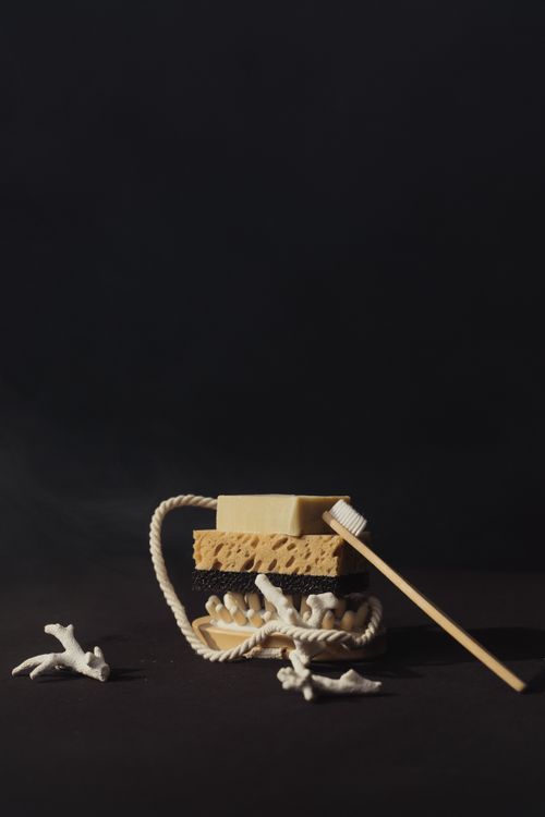 Free Elegant still life showcasing eco-friendly hygiene items in a minimalist studio setting. Stock Photo