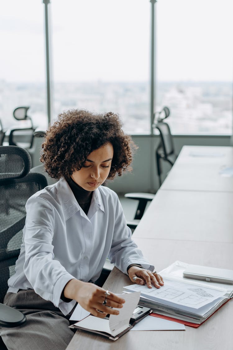 A Woman Working In The Office