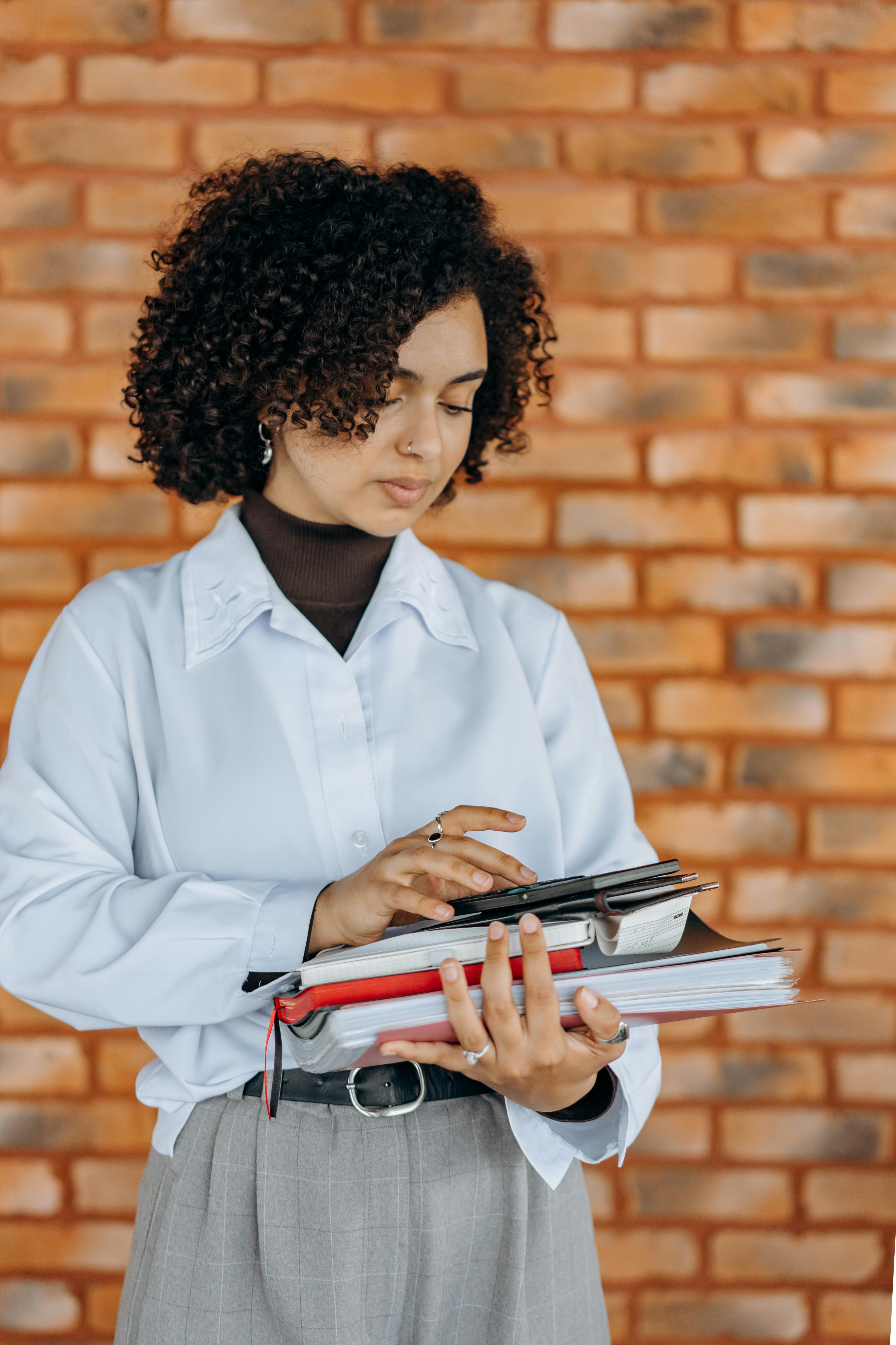 Woman with calculator and paper