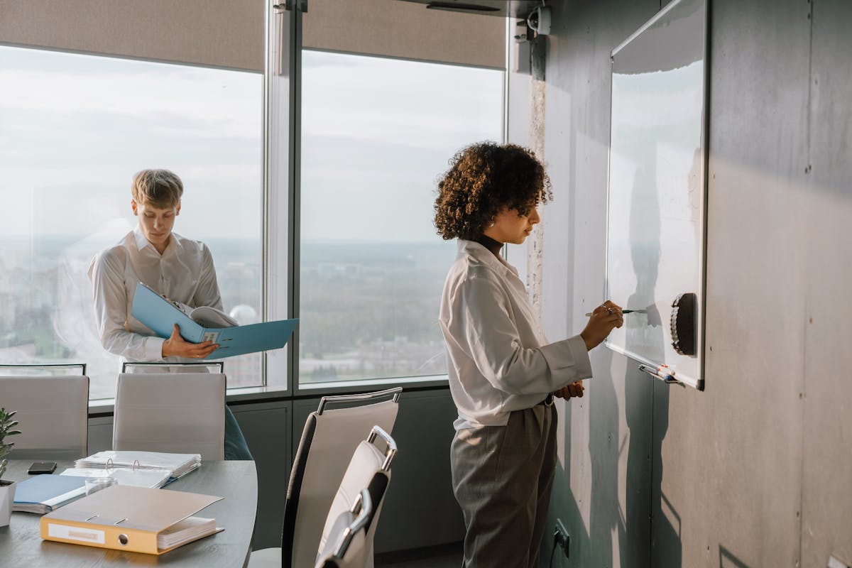 Data analyst looking at dashboards with cryptocurrency and NFT charts on a screen